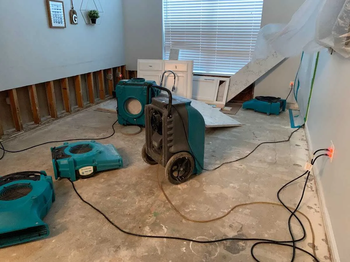 Dehumidifier in flood-cut room for Water Damage Restoration in Goffstown